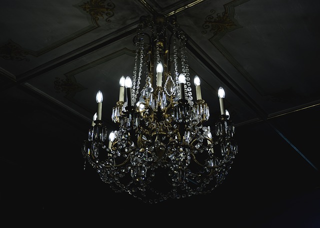 A chandelier in a dark room